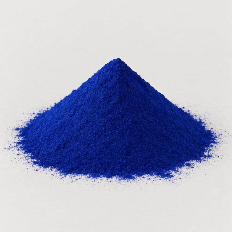 Small mound of deep blue raw coloring powder for DIY tablet binder mixing