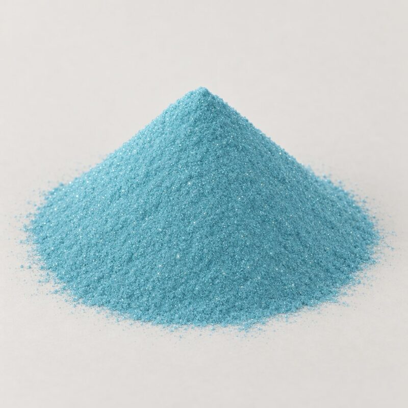 Mound of sapphire blue sparkle ready mix tablet binder powder with fine glitter