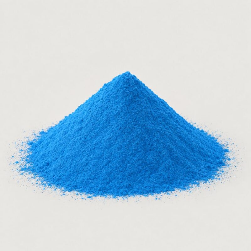 Small mound of pale light blue raw coloring powder for mixing into tablet binder