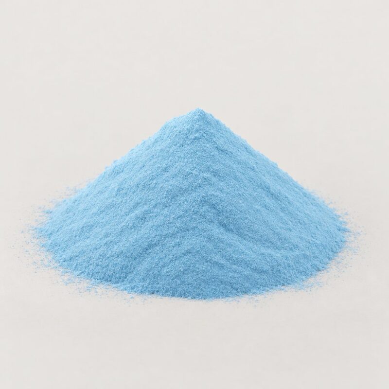 Mound of pale sky-blue ready mix tablet binder powder, a colored pill binder for vitamin tablets