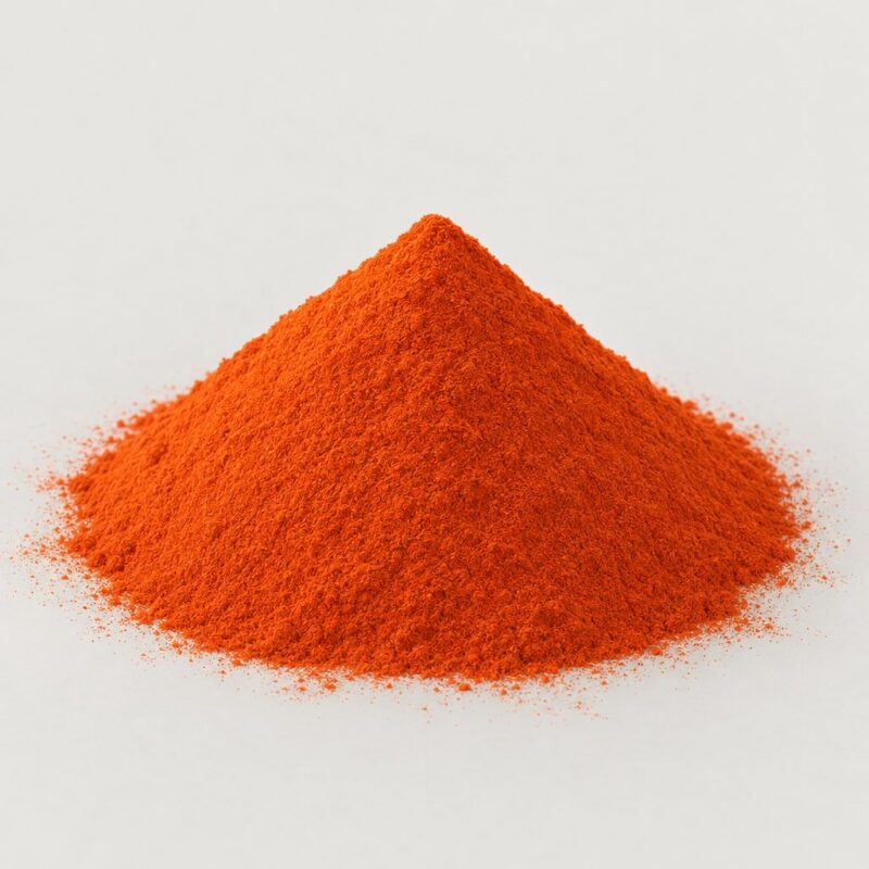 Small mound of pale orange cream raw coloring powder for DIY tablet binder mixing