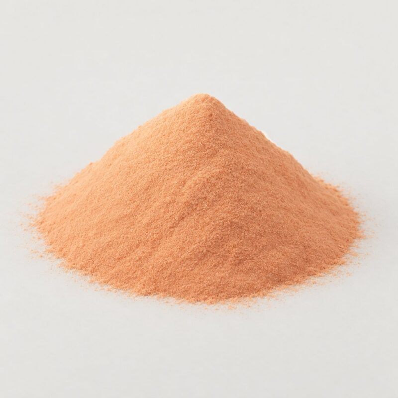 Mound of pale orange cream ready mix tablet binder powder, a pastel colored pill binder