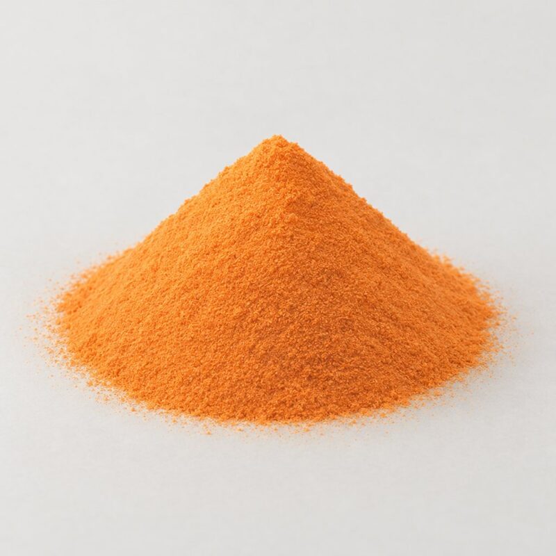 Mound of bright citrus-orange ready mix tablet binder powder, a colored pill binder