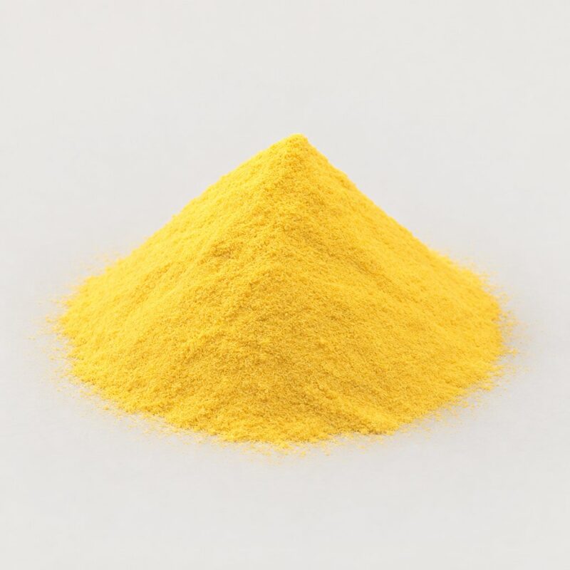 Mound of lemon-yellow ready mix tablet binder powder, a bright colored pill binder for vitamin tablets